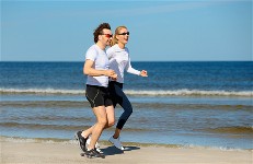 Healthy fit couple jogging